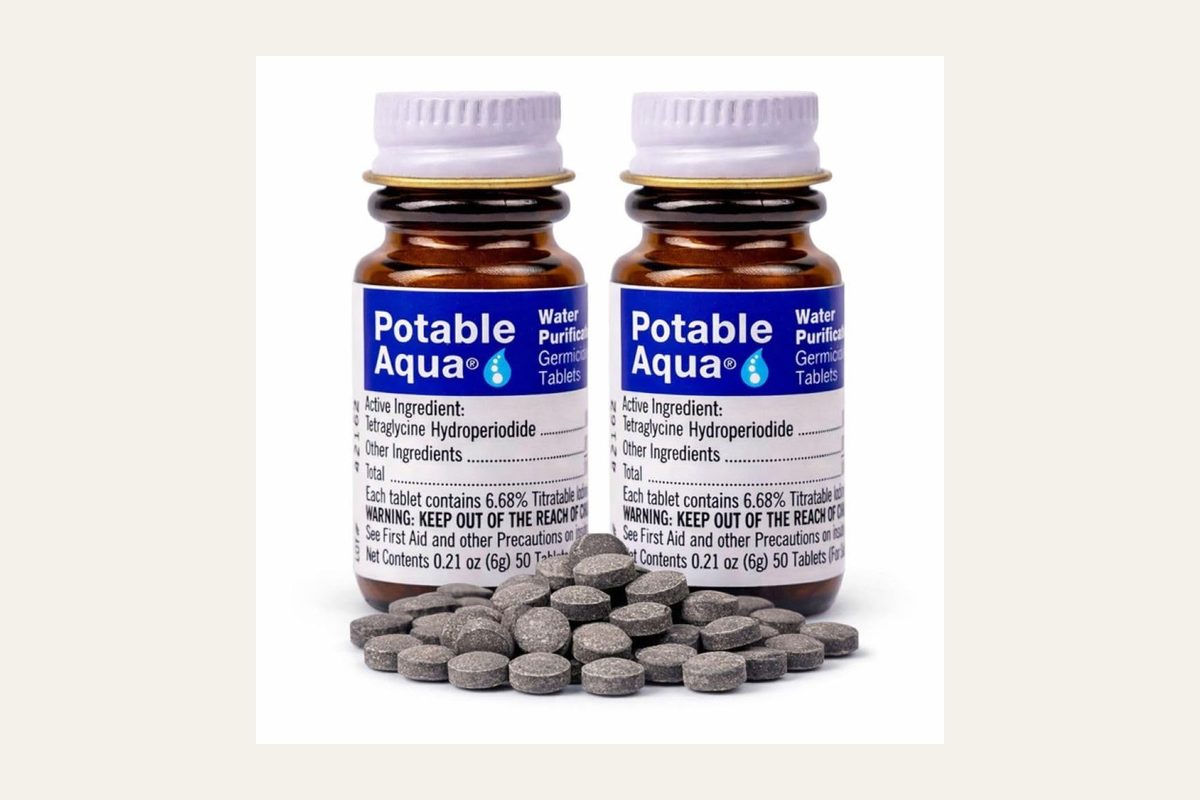 Potable Aqua water purification tablets, two 50-count bottles.