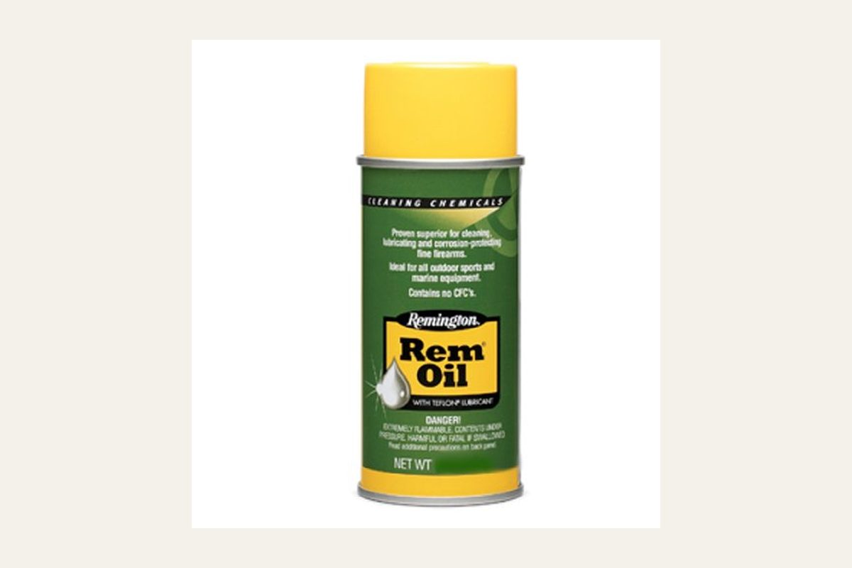 Remington Rem Oil 4 ounce aerosol can, model 26610, no firearm beside it.