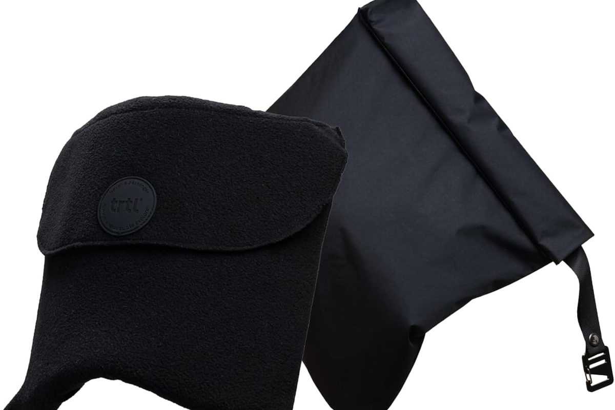 Trtl travel pillow Original 2.0 in jet black, a fleece neck wrap with no person wearing it.
