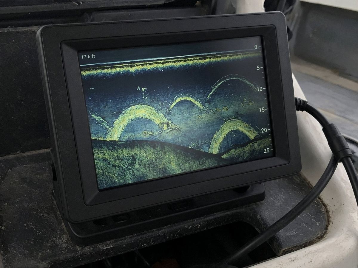 A 7-inch plotter is a console tool. The puck in clean water is still the unit.