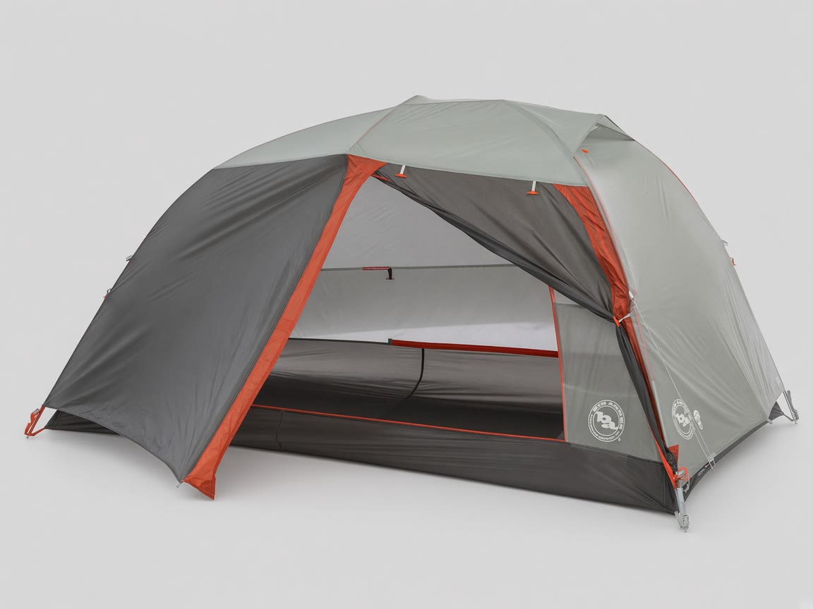Gray and orange two-person backpacking tent pitched on a plain background.
