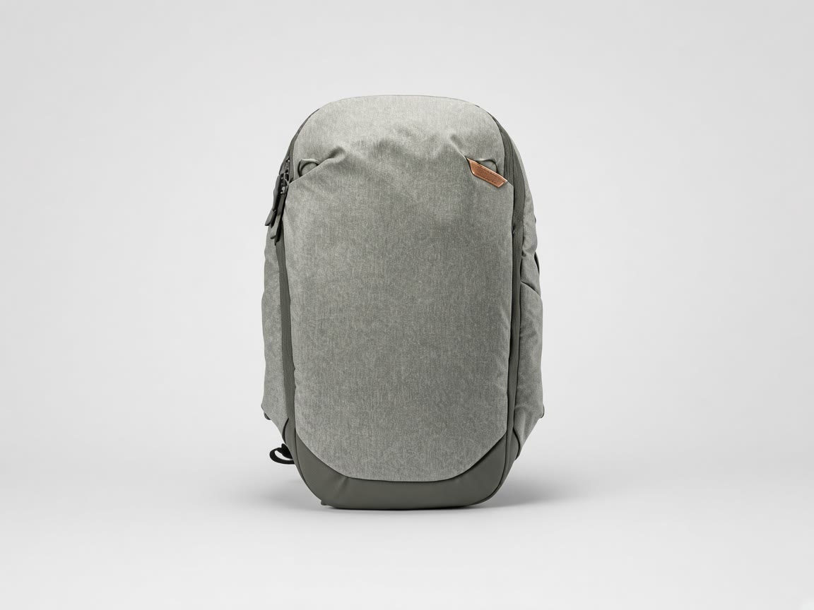 Sage travel backpack on a plain background.