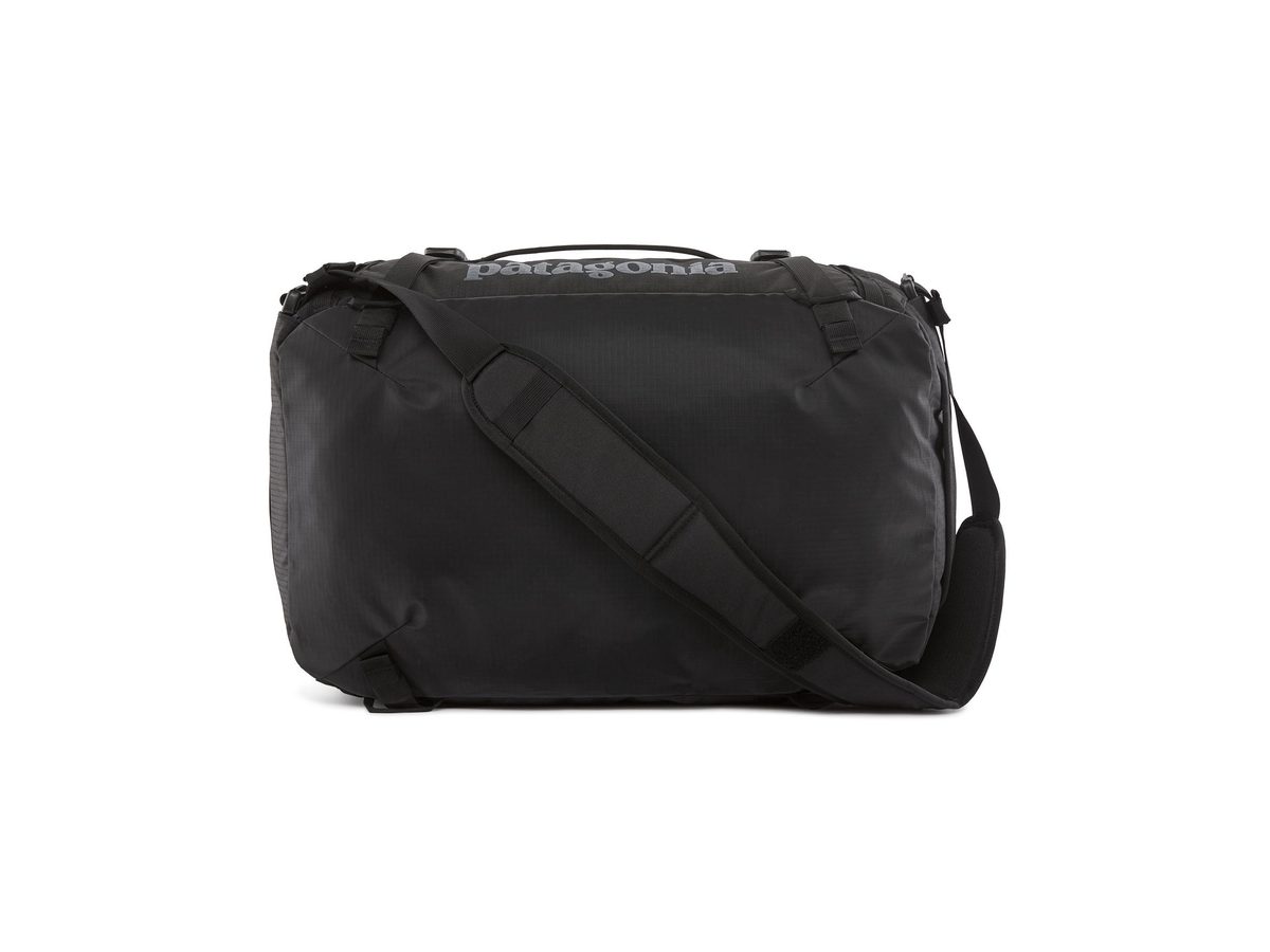 Patagonia Black Hole MLC 45. Clamshell suitcase, convertible straps, TPU that sheds weather. This is not a hiking 65.