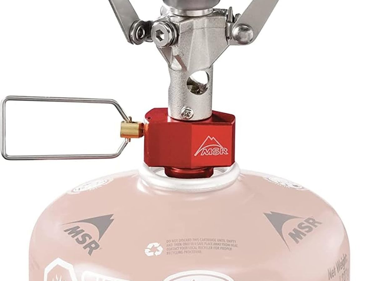 MSR PocketRocket 2 folding canister stove with its hard case.