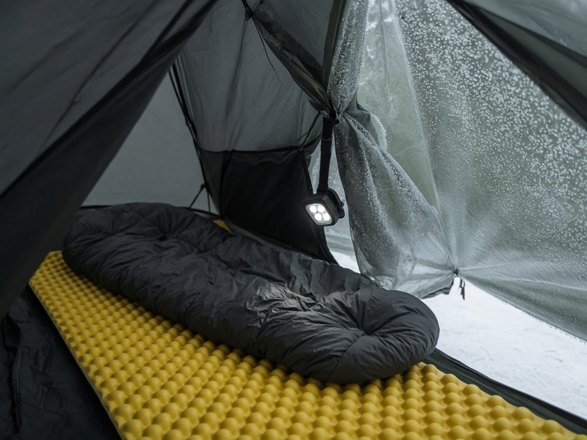 A mummy bag on foam in a cold tent. The pad is half the warmth.